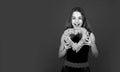 Happy Valentines day. Happy valentines girl red background. Small child with valentines heart. Celebration of love