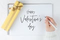 Happy Valentines day blank notebook among gift box Royalty Free Stock Photo