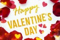 Happy Valentines Day gold text greeting card with red rose petals and shiny hearts bokeh on white wooden Background Royalty Free Stock Photo