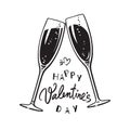 Happy Valentines Day handwritten calligraphic text with two sparkling glasses of champagne Royalty Free Stock Photo