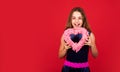 Happy Valentines day. Happy valentines girl red background. Small child with valentines heart. Celebration of love