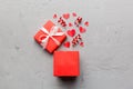 Happy valentines day opened heart shape gift box with small hearts, on colored background, valentines day card - top Royalty Free Stock Photo