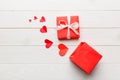 Happy valentines day opened heart shape gift box with small hearts, on colored background, valentines day card - top Royalty Free Stock Photo