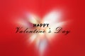 Happy Valentines Day on shining heart shaped illustration background in red. Valentines Day card concept. Royalty Free Stock Photo