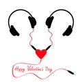 Happy Valentines Day. Two headphones. Earphones couple Audio splitter adapter heart. Red cord. Love greeting card. White