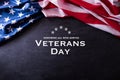 Happy Veterans Day. American flags veterans against a blackboard background Royalty Free Stock Photo