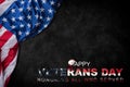 Happy Veterans Day. American flags with the text thank you veterans against a blackboard background. Royalty Free Stock Photo