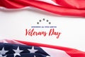 Happy Veterans Day. American flags with the text thank you veterans against a white background. November 11 Royalty Free Stock Photo