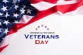 Happy Veterans Day. American flags with the text thank you veterans against a white background. November 11 Royalty Free Stock Photo