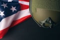 Military helmets and American flag on background Royalty Free Stock Photo