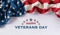 Happy Veterans Day concept. American flags against white wooden  background. November 11 Royalty Free Stock Photo