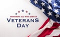 Happy Veterans Day concept. American flags and the text against white background. November 11 Royalty Free Stock Photo