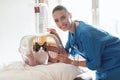 Happy Veterinarian Doctor Opening Pet Carrier With Cute Cat Indoor