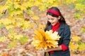 Happy vintage kid gather yellow maple leaves, autumn Royalty Free Stock Photo