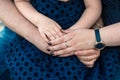 Happy volunteer family putting their hands together Royalty Free Stock Photo