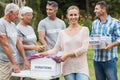 Happy volunteer family separating donations stuffs Royalty Free Stock Photo