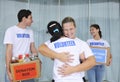 Happy volunteer group with food donation Royalty Free Stock Photo