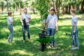 happy volunteers planting trees Royalty Free Stock Photo