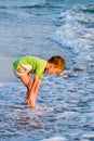 Happy walking child on the sea Royalty Free Stock Photo