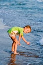 Happy walking child on the sea Royalty Free Stock Photo