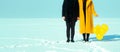 Happy walking couple. In love man and woman walking on the snowy ice. Winter vacation concept. Royalty Free Stock Photo