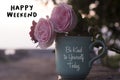 Happy weekend concept with soft pink roses at sunrise and text message on cup of coffee - Be kind to yourself today. Self love. Royalty Free Stock Photo