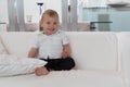 Happy well behaved toddler sitting at home Royalty Free Stock Photo