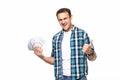 Happy winner man in casual t-shirt smiling with money in dollar banknotes isolated over white background Royalty Free Stock Photo