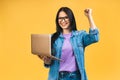 Happy winner! Portrait of attractive surprised excited smiling business woman with laptop, isolated over yellow background Royalty Free Stock Photo