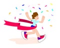 Happy Winner. Runner crossing the finish line with red ribbon. Finisher of marathon with confetti. Man is jogging Royalty Free Stock Photo