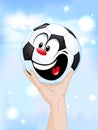 Happy winner - soccer ball in hand