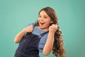 Happy winner. Successful happy kid. Achieve success. Kid cheerful celebrate victory. Girl cute child long curly hair Royalty Free Stock Photo