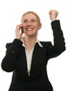 Happy winning businesswoman talking on cell phone Royalty Free Stock Photo