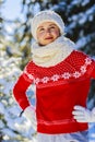 Happy winter girl wearing knitted wear scarf. Excited beautiful