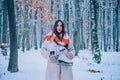 Happy Winter Girl. Winter portrait of young woman in the winter snowy scenery. Outdoor portrait of young pretty Royalty Free Stock Photo