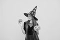 happy witch teenage girl with pumpkin jack o lantern wear costume of wizard on halloween party, halloween jack o lantern Royalty Free Stock Photo