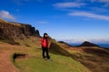 Happy woman admiring stunning view at the Quiraing, Scotland Royalty Free Stock Photo