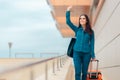 Happy Woman At Airport Station with Suitcase Royalty Free Stock Photo