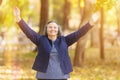 Happy woman with arms outstretched Royalty Free Stock Photo