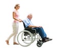 Happy Woman Assisting Her Disabled Father On Wheelchair Royalty Free Stock Photo