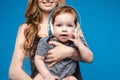 Happy woman with baby boy in headphones. Royalty Free Stock Photo