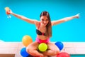 Happy woman with balloons and cocktail. Royalty Free Stock Photo