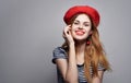 Happy woman in beret with bright makeup earrings model t-shirt