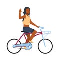 Happy woman on bike. Cartoon girl riding on bicycle. Young African female character greeting waving hand. Profile view Royalty Free Stock Photo