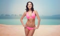 Happy woman in bikini over swimming pool Royalty Free Stock Photo