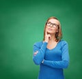 Happy woman in black eyeglasses dreaming Royalty Free Stock Photo