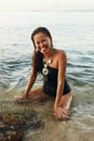 Happy Woman In Black Fashion Swimwear Having Fun In Sea Royalty Free Stock Photo