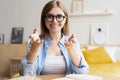 Happy woman blogger applicant teacher sit at home office look at camera doing online job interview during video chat Royalty Free Stock Photo