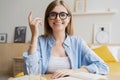 Happy woman blogger applicant teacher sit at home office look at camera doing online job interview during video chat Royalty Free Stock Photo