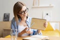 Happy woman blogger applicant teacher sit at home office look at camera doing online job interview during video chat Royalty Free Stock Photo